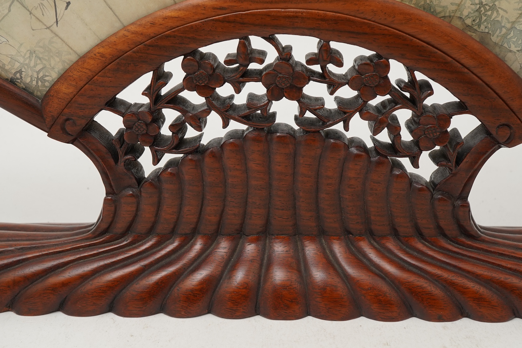 A Chinese painted paper fan leaf, 19th century, with hongmu frame and stand, early 20th century